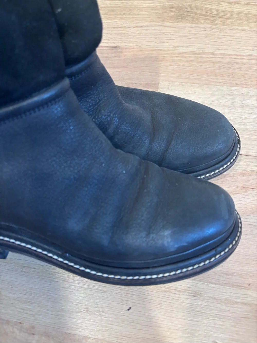 CHANEL black leather & suede boots with an embossed CC logo on heel size 37